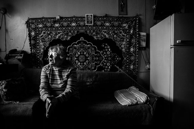 Arik Shraga. Humanitarian Photography. "Being disabled and totally alone I manage to survive on my own"