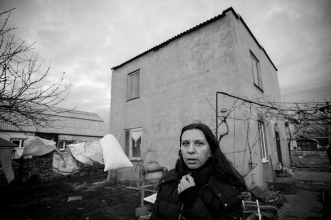 Arik Shraga. Ukraine. Olga in her backyard