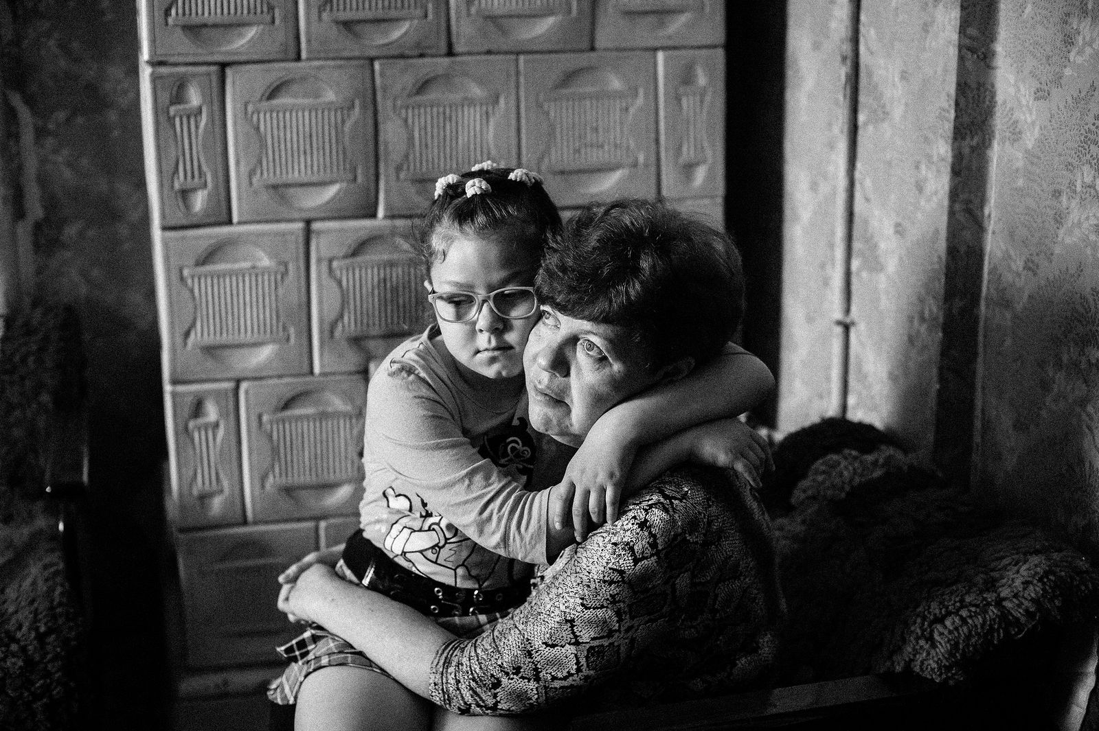 Arik Shraga. "Joint" Families: The Stories of Love. Lvov. Vera with her mother Vera and her mother ran away from Lugansk in 2014. The family splitted because of politics: Vera’s father shared pro-Russian ideas, and Vera’s mother could not accept it. In Lvov they didn’t have any family by Lena managed to find a job at a local Hesed. Her family broke apart and she has no her own home anymore but she is happy to start a new life with her little talented and much loved Vera.
