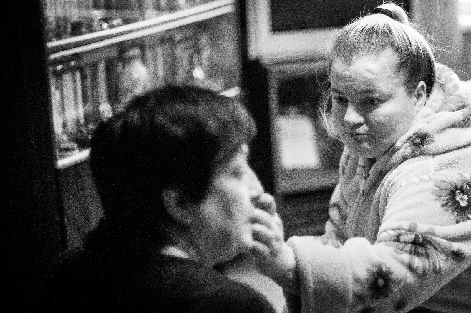 Arik Shraga. "Joint" Families: The Stories of Love. Chelyabinsk. Danilov family The whole family keeps up due to the efforts of Lilia, a woman of seemingly unlimited capabilities. Mother of 3, she deals with numerous and hard problems.
Lilia’s husband is a bed-bound with severe diseases. He bedwets and refuses from any diapers and even specialized bedsheets because they hurt.
Lilia’s daughter was born with the defects of urogenital system and with mental retardation. Her bladder was absent, she underwent several surgeries and lived first 2.5 years with open pelvic cavity.
She’s doing her best to help her mother but she needs a lot of attention herself.
One of Lilia’s sons has mental problems which don’t let him stay any long period of time at any job. "He has only half of his brain after he was assaulted," she tells.
Besides that Lilia’s got a cousin residing in another town, some 20 km away from Chelyabinsk, who is lonely and also got sick and requires attention and assistance, so she rushes to him several days a week.