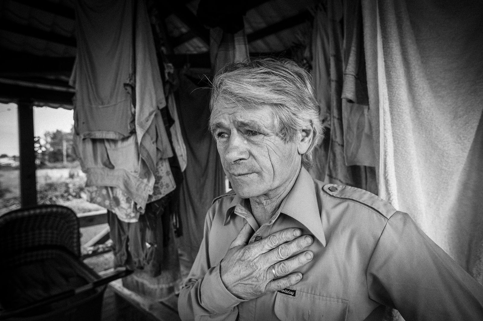 Arik Shraga. Humanitarian Photography. The family of this worker from Riga consists of 10 kids, 10 grandkids, 3 adopted kids. They live in a house built up from ruins