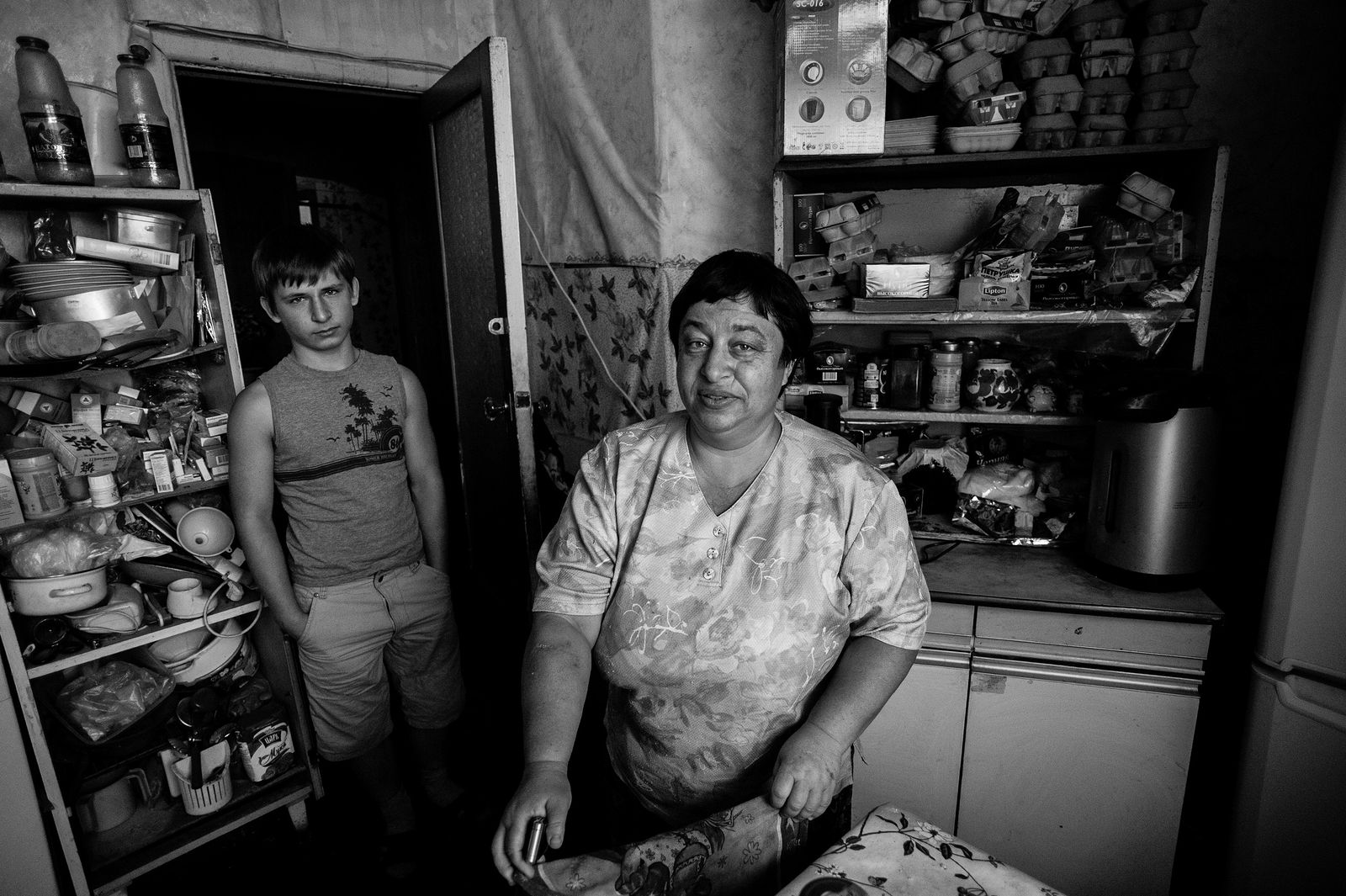 Arik Shraga. Russia. Ural region. Cheljabinsk "As someone said, a rich man is the one who has enough, and not the one who has a lot," pronounces Igor’s mother as we stand in the middle of a kitchen besides an almost empty fridge.